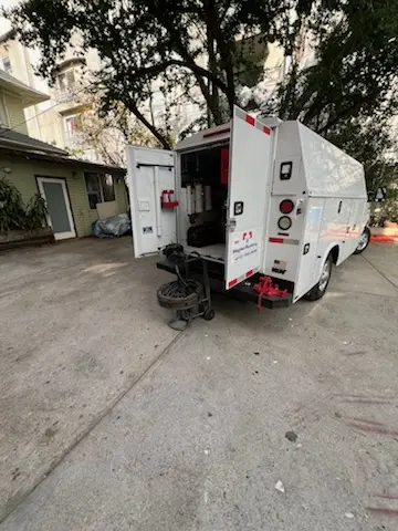 Magnet Plumbing service vehicle on-site for Grease Trap Cleaning in Wekiwa Springs